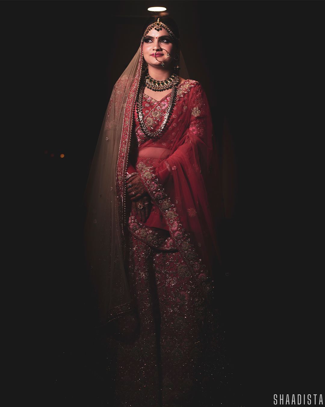 Cinematic close-up bridal portrait in red – wedding videography Delhi Shaadista