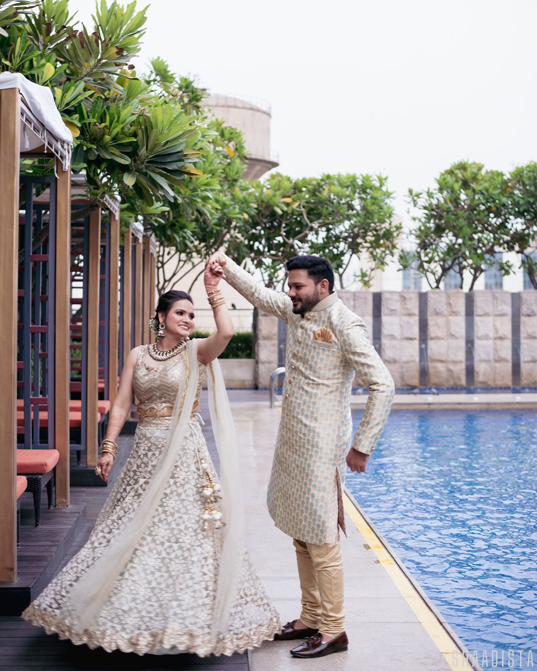 Bride with floral veil candid moment – wedding photographer Delhi Shaadista
