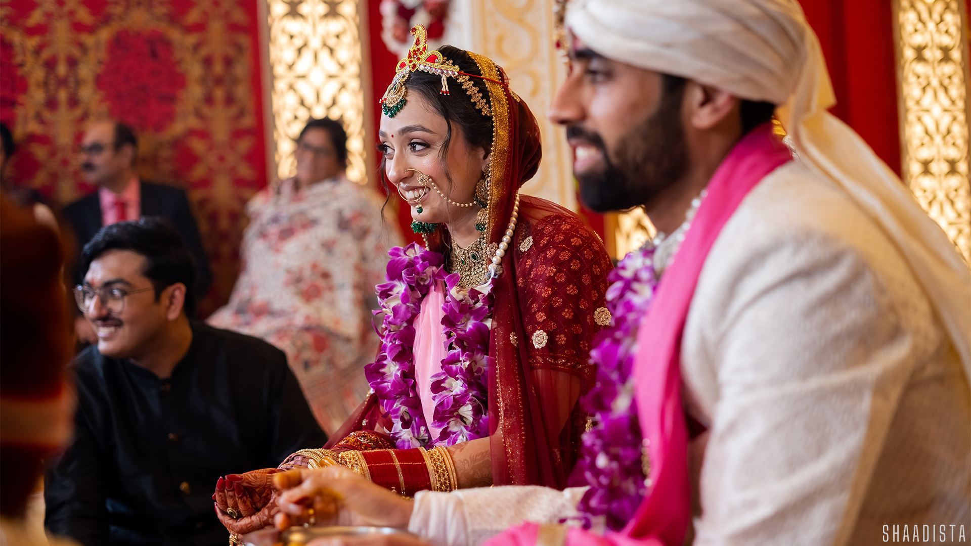Groom with bride in teal lehenga – candid couple photography Delhi Shaadista